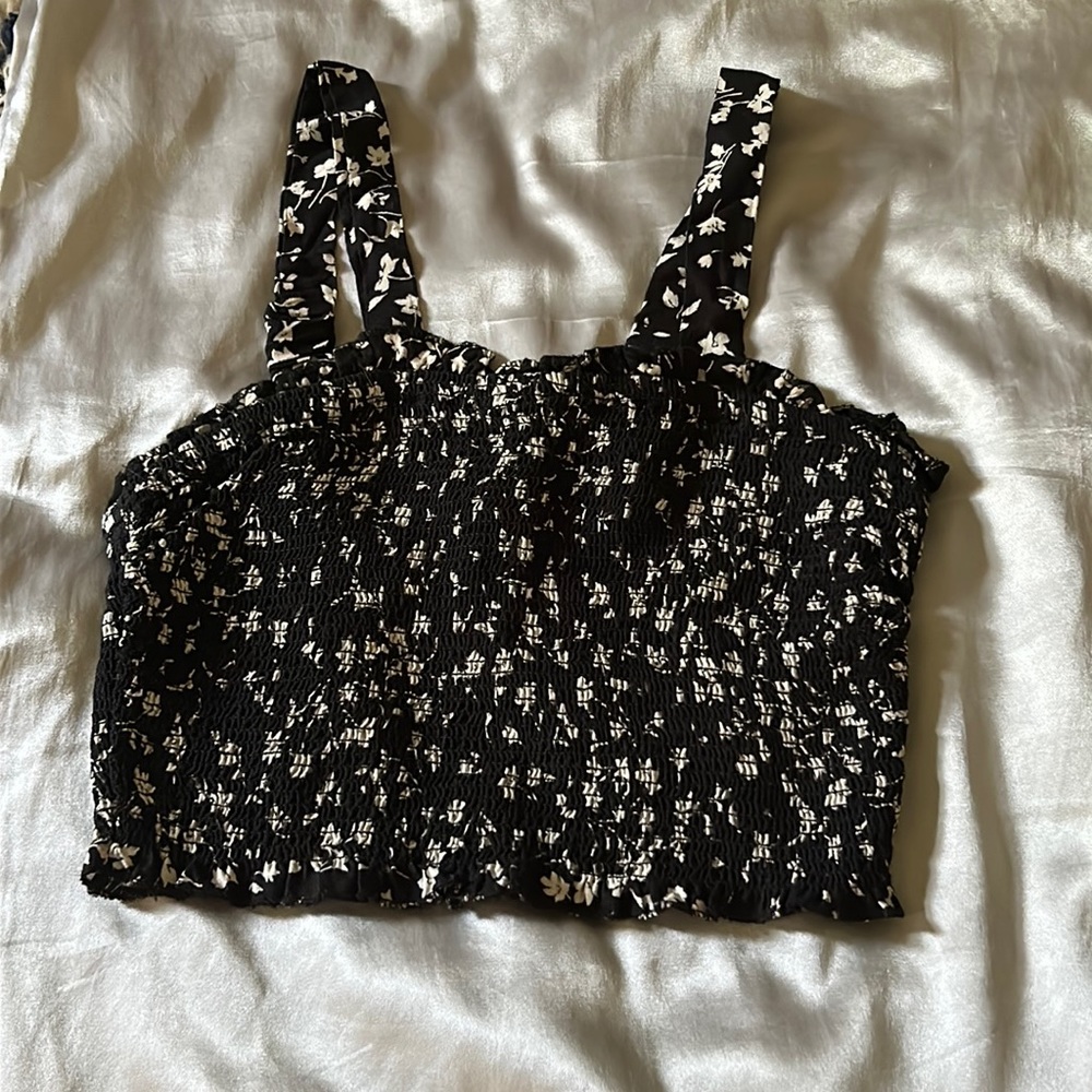 black cropped tank top with floral pattern